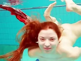 Polish redhead loves taking a swim and fucking after it