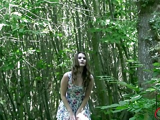 Outdoors masturbation in the forest with a cute teen babe