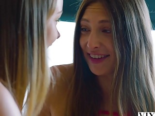 Beautiful Naomi Swann and Talia Mint share a dick outdoor