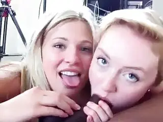 Two slutty girls fuck hard in a nasty interracial threesome